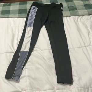 Black purple and white NCA legging in a small